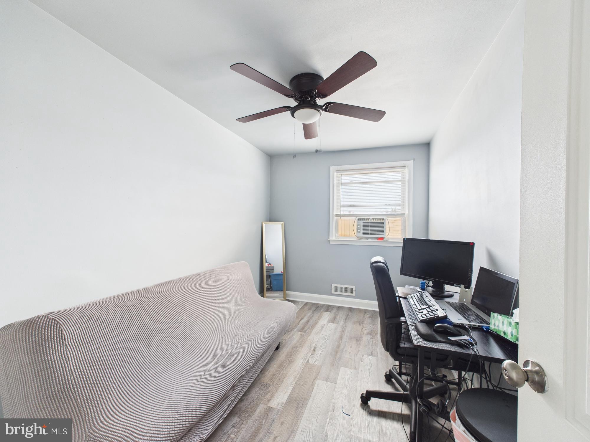 1551 Langford Road Baltimore, MD 21207 - Photo 39 of 52 a workspace with furniture and a window