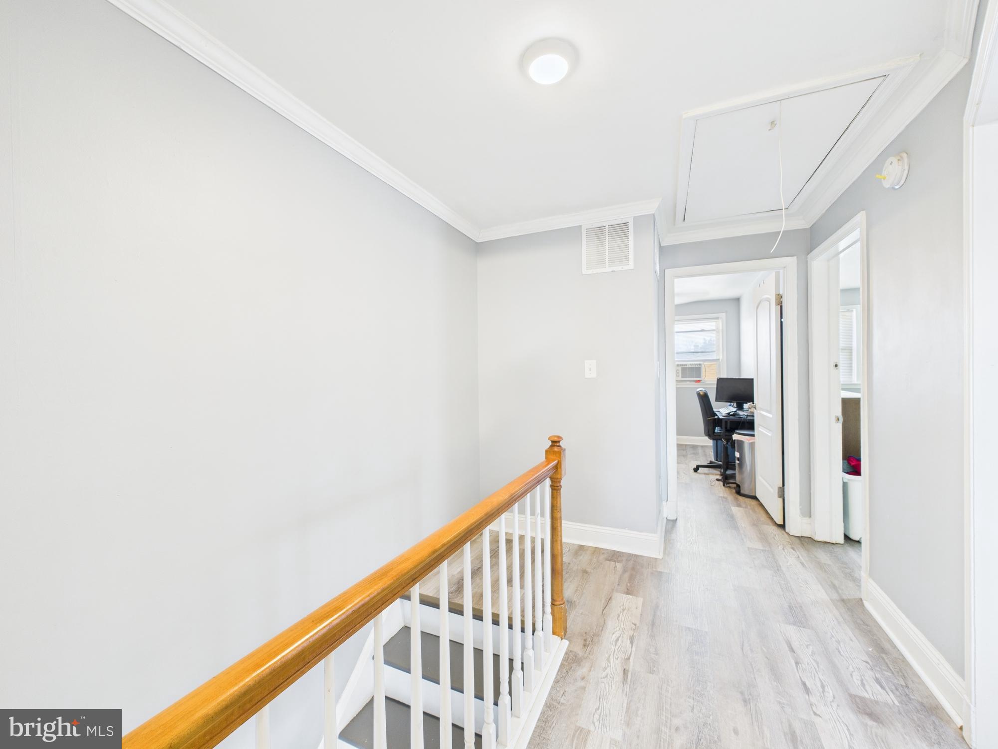 1551 Langford Road Baltimore, MD 21207 - Photo 51 of 52 a view of hallway with wooden floor