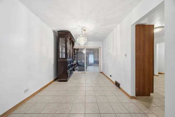 a view of a hallway view with staircase