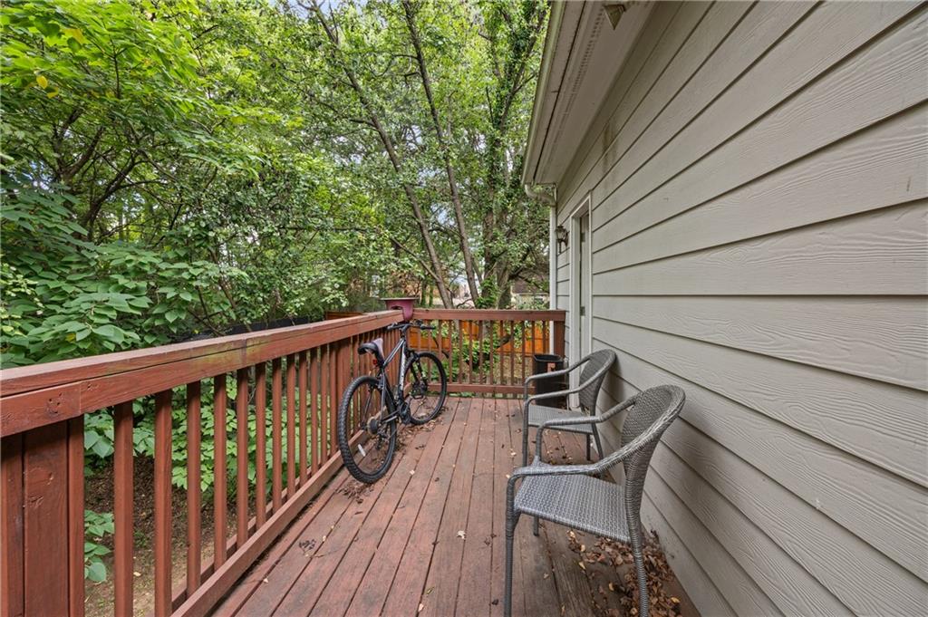 581 Cooper Street Southwest Atlanta, GA 30312 - Photo 24 of 26 a view of balcony with wooden floor and outdoor seating