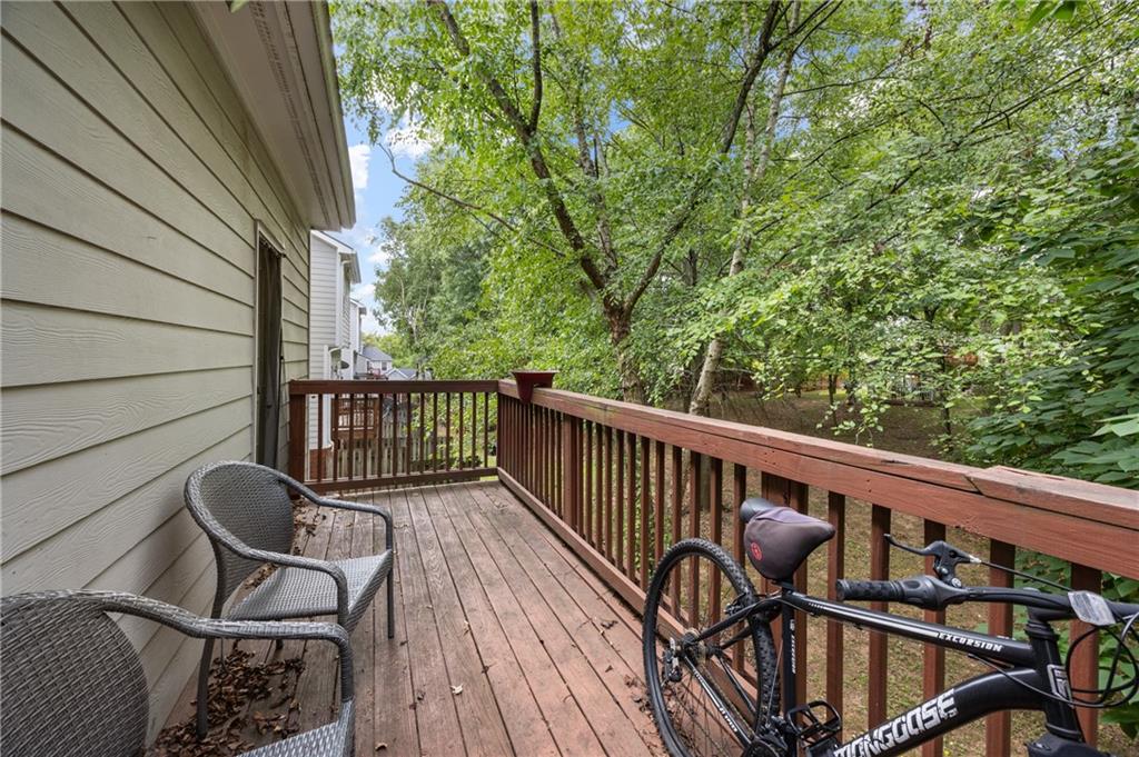 581 Cooper Street Southwest Atlanta, GA 30312 - Photo 25 of 26 a view of balcony with wooden floor and outdoor seating
