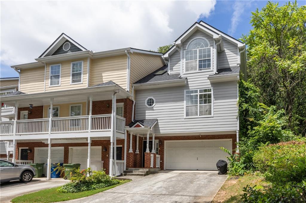 581 Cooper Street Southwest Atlanta, GA 30312 - Photo 3 of 26 a front view of a house with garden