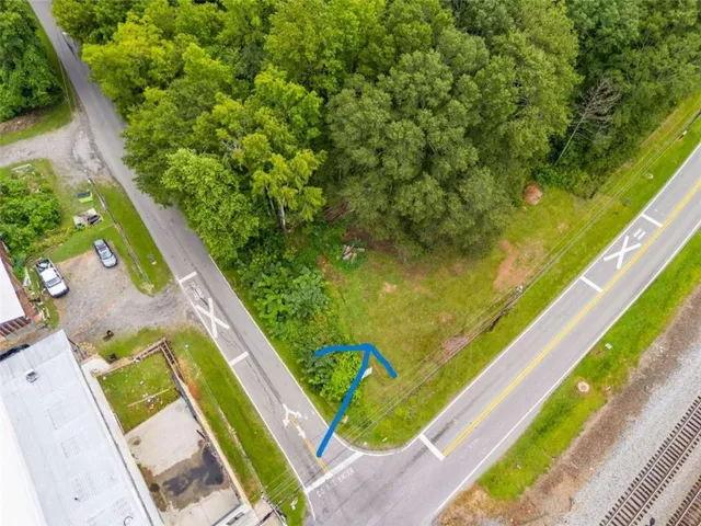 a view of swimming pool with a yard