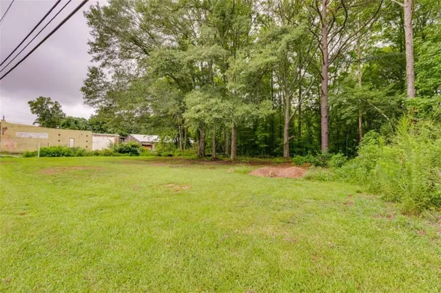 a view of swimming pool with yard
