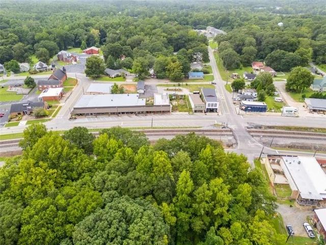a view of a yard with an outdoor seating