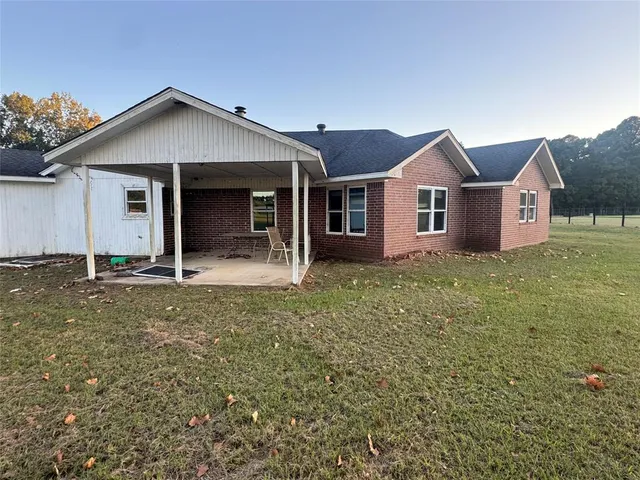a view of outdoor space with trees all around