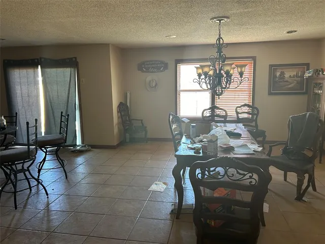 a view of a livingroom with furniture and window