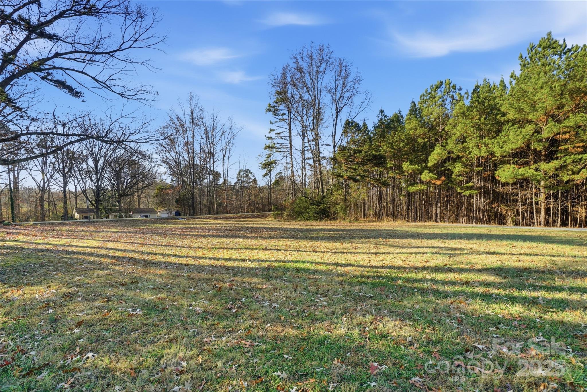 0 Fincher Road Matthews, NC 28104 - Photo 17 of 18 a view of a swimming pool with an outdoor space and seating area