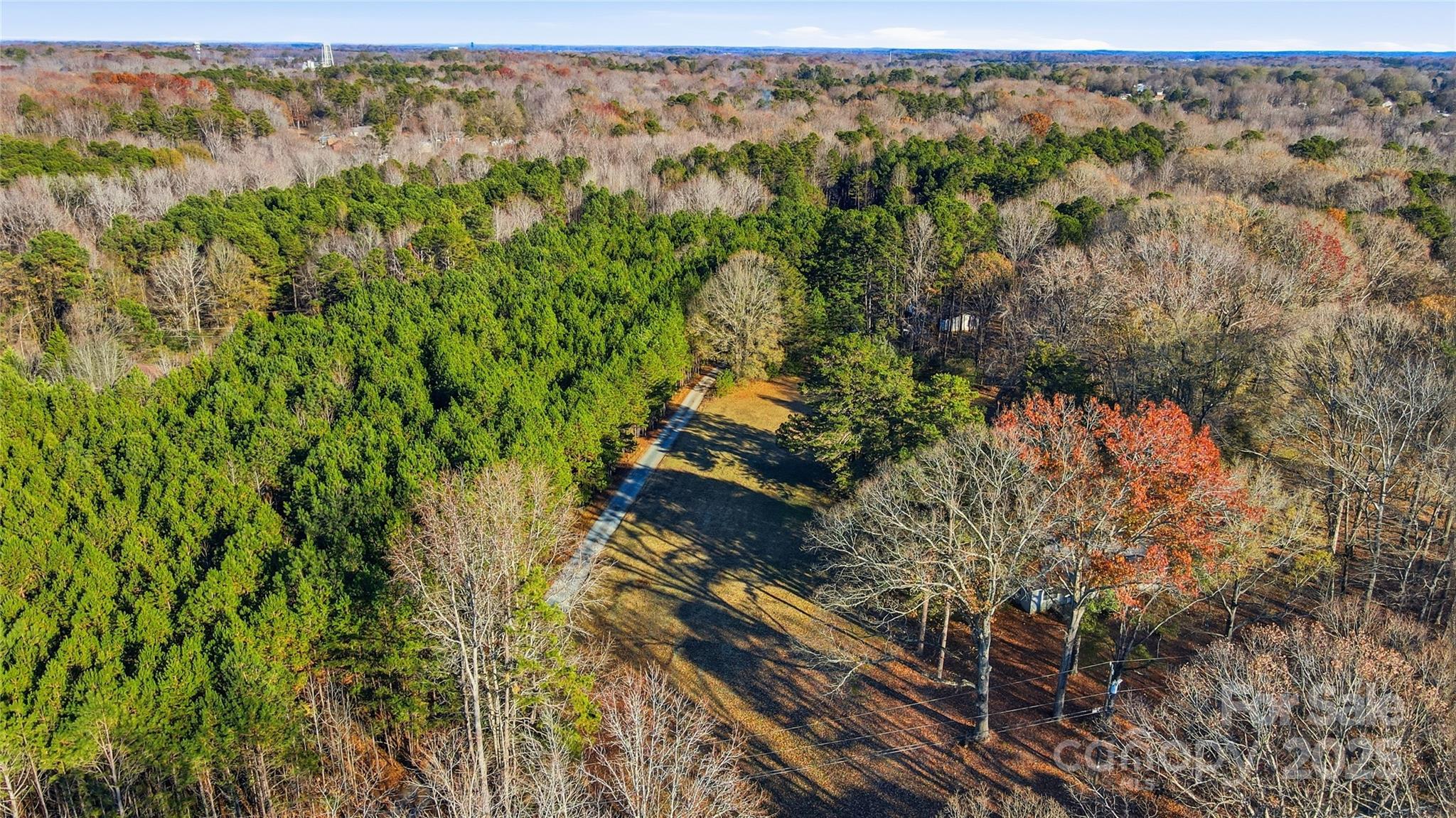 0 Fincher Road Matthews, NC 28104 - Photo 10 of 18 a view of a yard with wooden fence