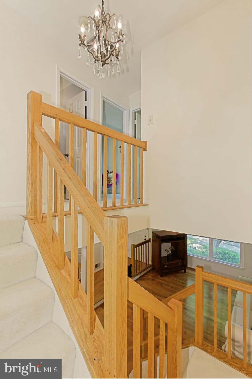 1628 Oak Spring Way Reston, VA 20190 - Photo 14 of 30 Open Staircase with Designer Lighting