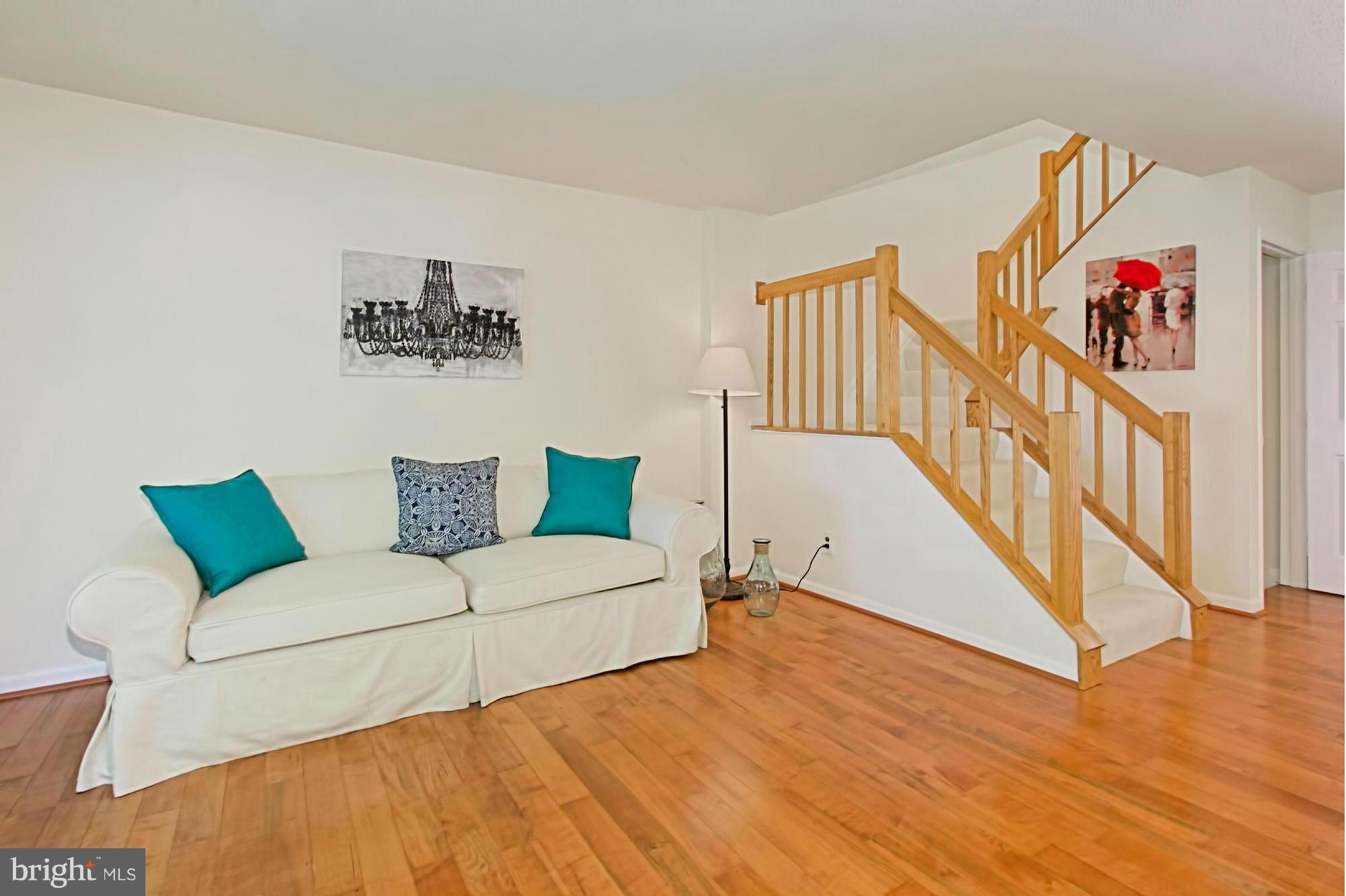 1628 Oak Spring Way Reston, VA 20190 - Photo 3 of 30 Family Room with Hardwood Floors