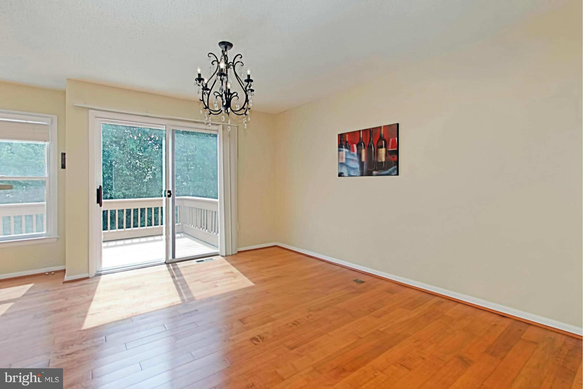1628 Oak Spring Way Reston, VA 20190 - Photo 8 of 30 Kitchen Opens to Large Deck Backing to Trees