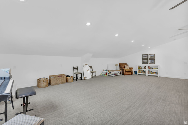 1766 West Tollgate Cyn Road Coalville, UT 84017 - Photo 26 of 59 Spacious carpeted room featuring recessed lighting, a sloped ceiling, and a ceiling fan