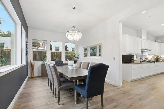a view of a living room and floor to ceiling window