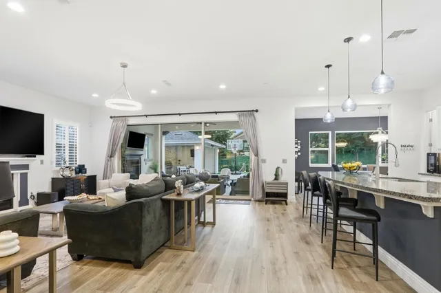 a room with gym equipment and a large window