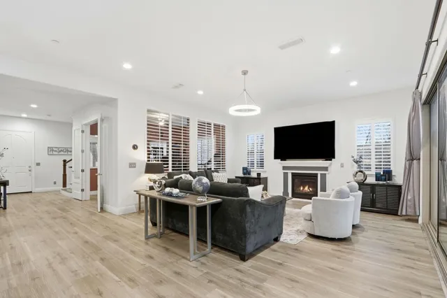a front view of a house with a yard table and chairs