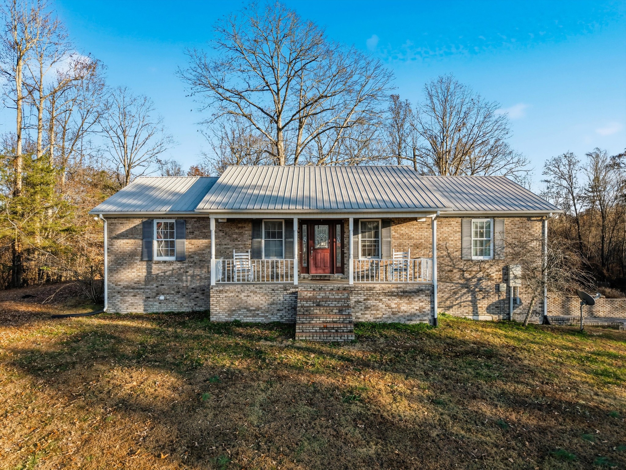 450 Poss Road Smithville, TN 37166 - Photo 1 of 33 front view of a house with a yard