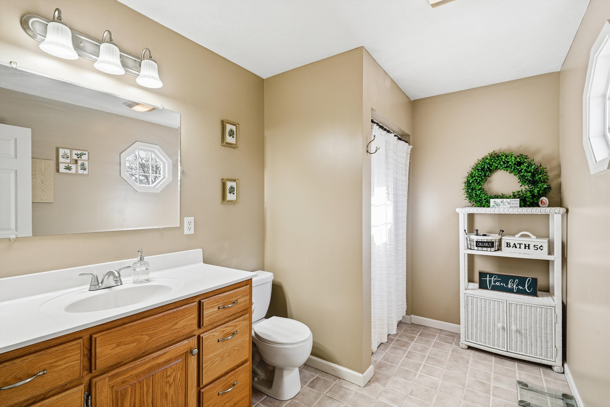 450 Poss Road Smithville, TN 37166 - Photo 12 of 33 a bathroom with a toilet sink and mirror