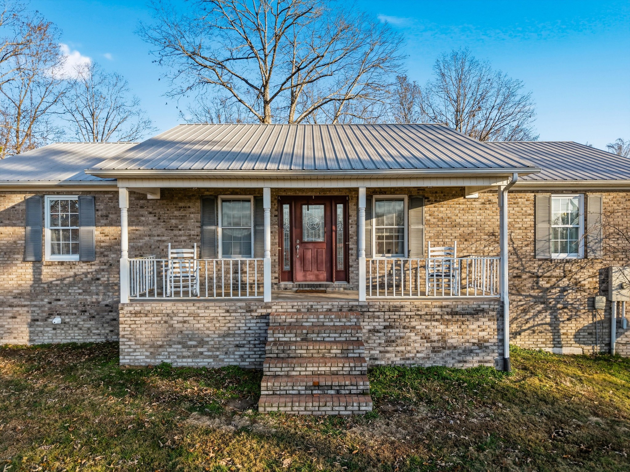 450 Poss Road Smithville, TN 37166 - Photo 18 of 33 front view of a house with a yard