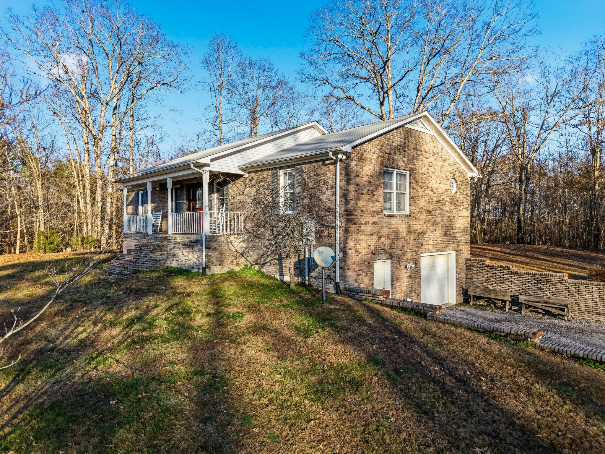 450 Poss Road Smithville, TN 37166 - Photo 22 of 33 a view of a house with a yard