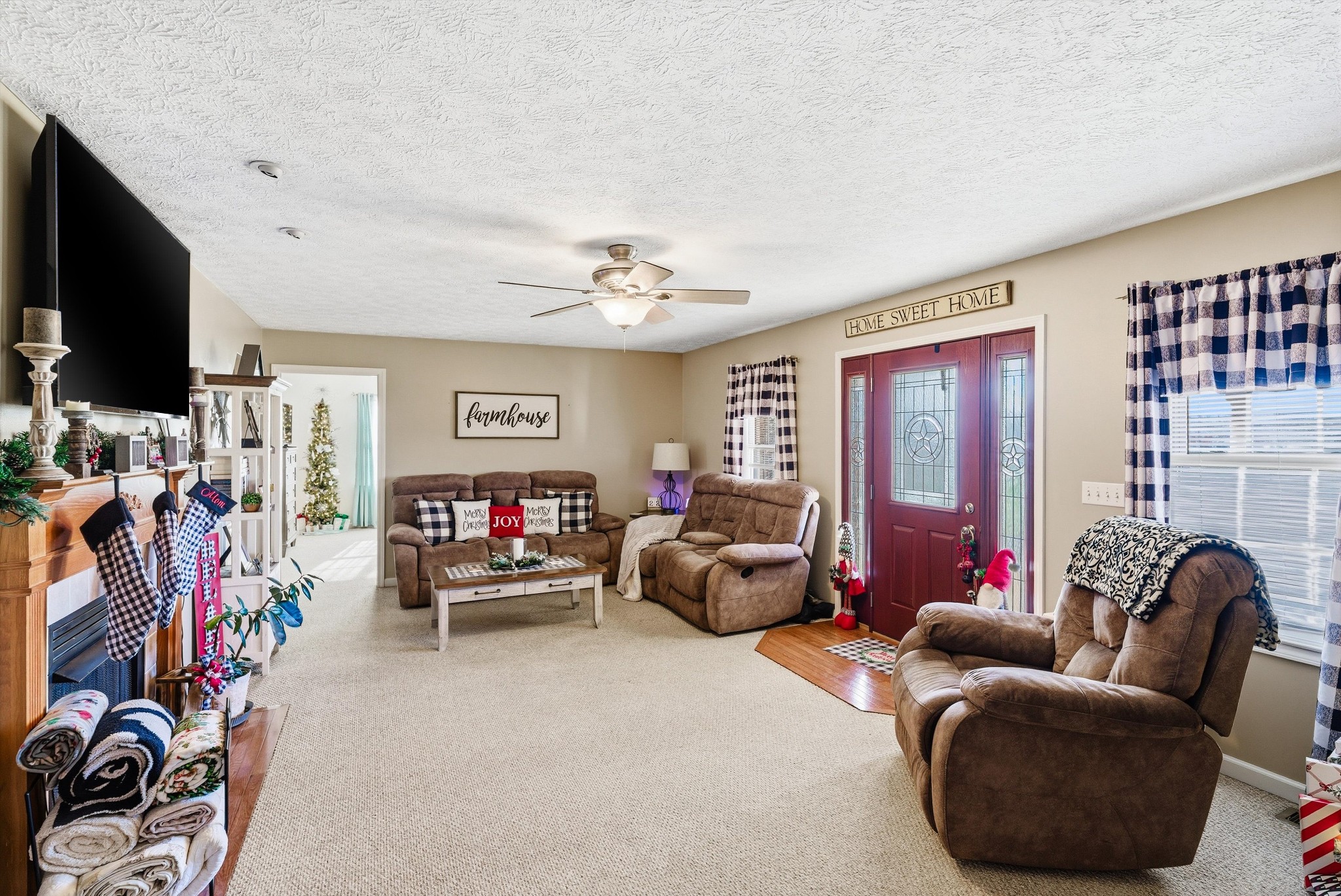 450 Poss Road Smithville, TN 37166 - Photo 4 of 33 a living room with furniture and a flat screen tv