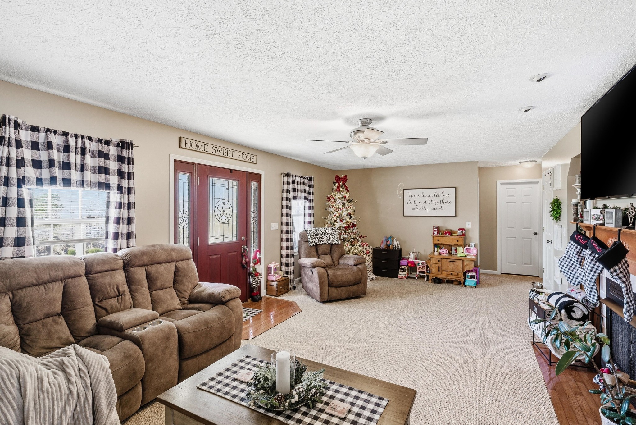 450 Poss Road Smithville, TN 37166 - Photo 5 of 33 a living room with furniture and a flat screen tv