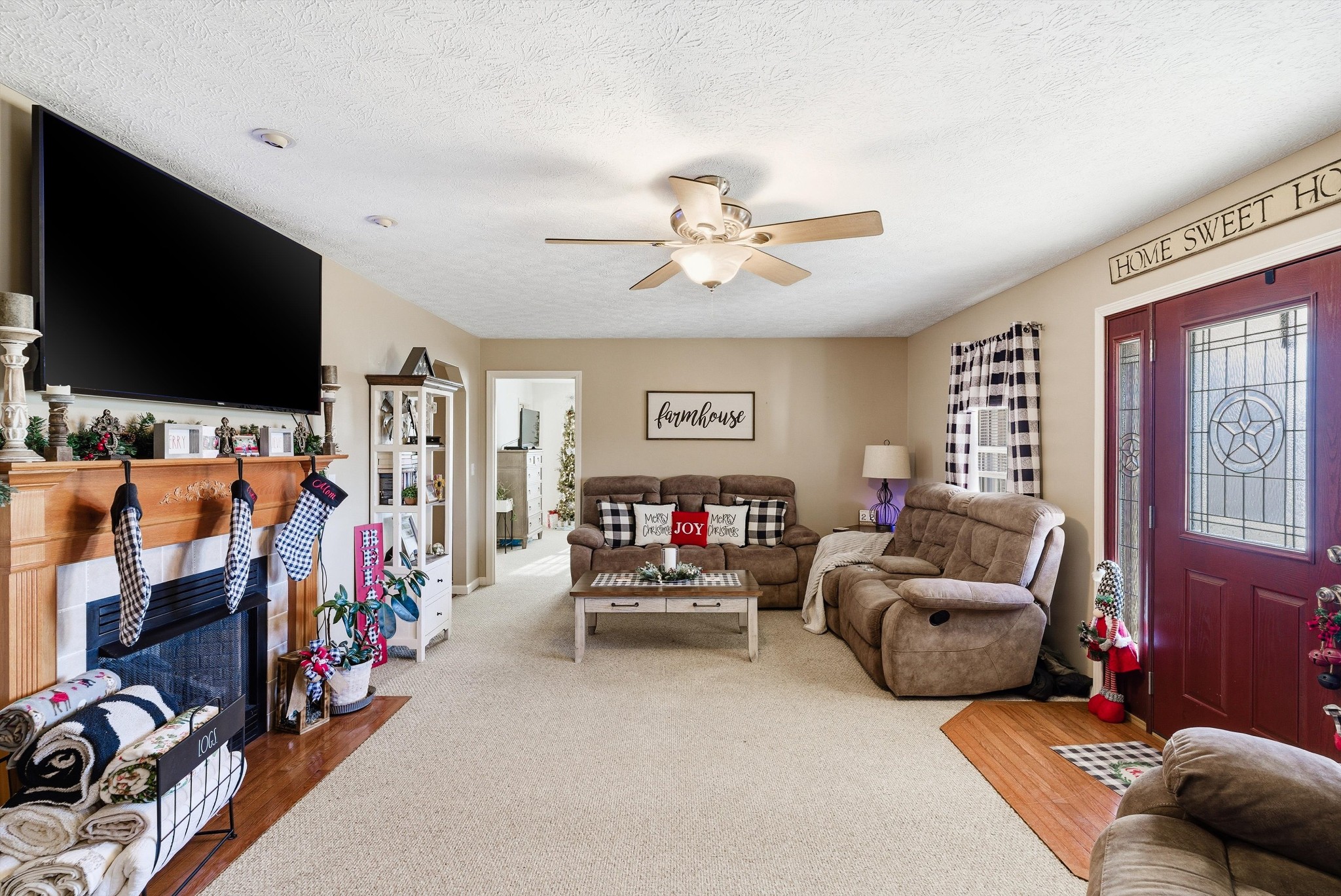 450 Poss Road Smithville, TN 37166 - Photo 6 of 33 a living room with furniture and a flat screen tv