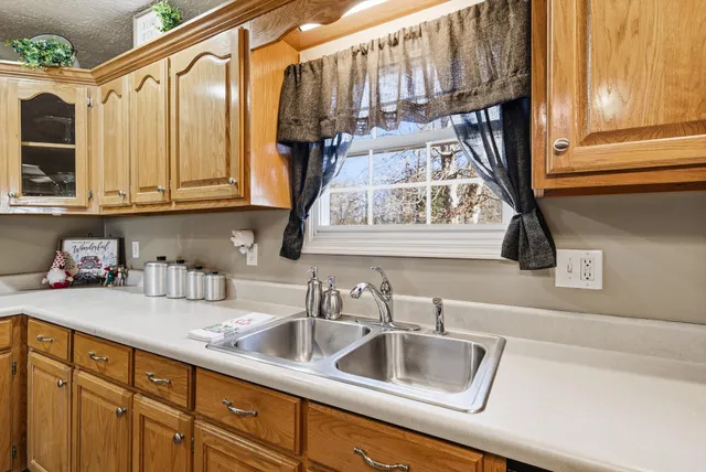 a bed room with a bed and a window