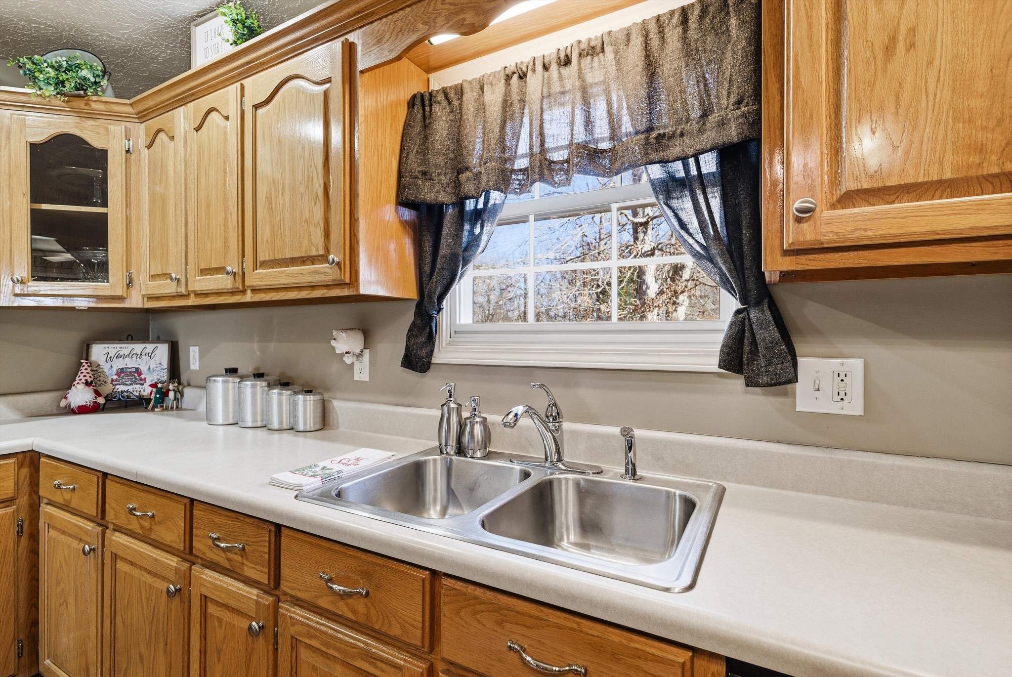 450 Poss Road Smithville, TN 37166 - Photo 10 of 33 a kitchen with a sink and cabinets