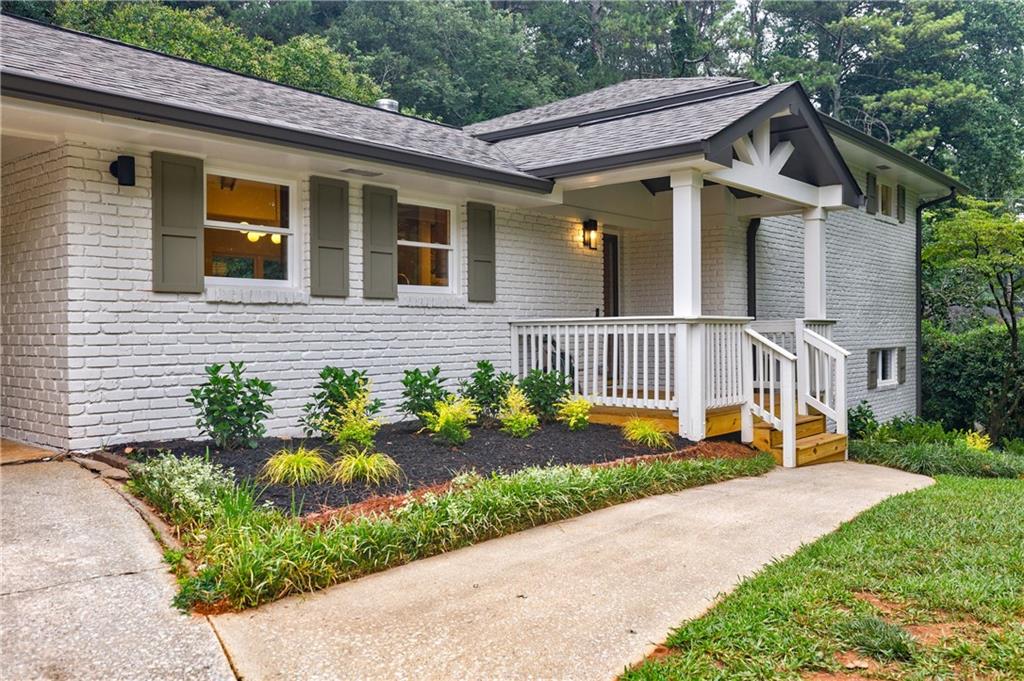 2000 Hollidon Road Decatur, GA 30033 - Photo 1 of 1 a front view of a house with a yard