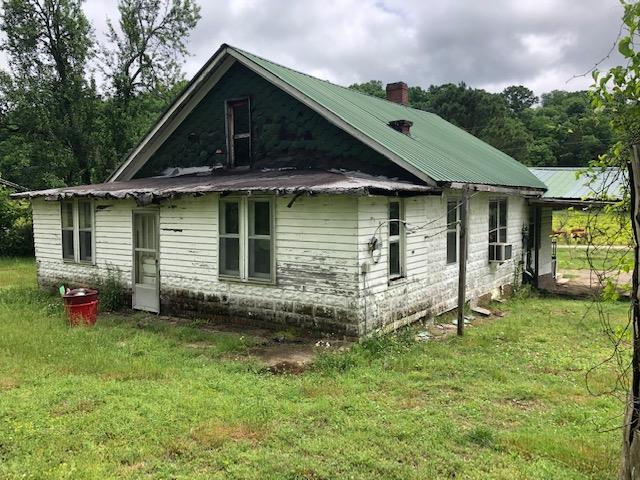 376 Ingram Road Pulaski, TN 38478 - Photo 2 of 5 a front view of a house with garden