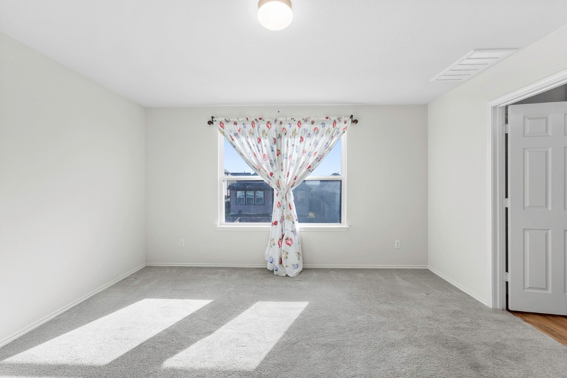 967 Pepperbark Loop Buda, TX 78610 - Photo 12 of 29 Large primary bedroom located on 2nd floor