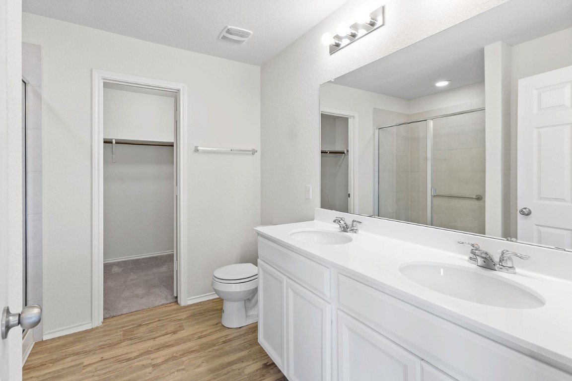 967 Pepperbark Loop Buda, TX 78610 - Photo 13 of 29 Large primary bathroom located on 2nd floor
