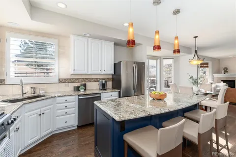a bathroom with a toilet a sink and a mirror