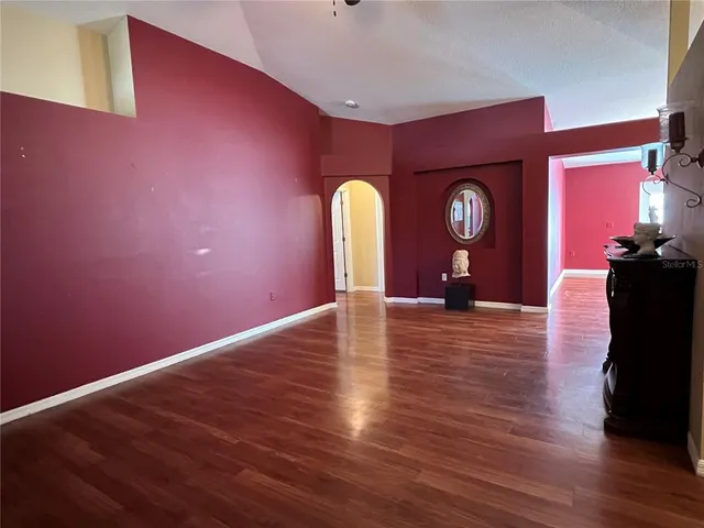 a view of a livingroom with wooden floor