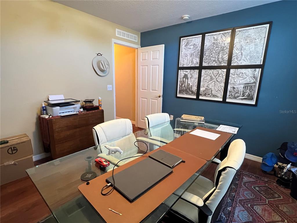 14367 Finsbury Drive Spring Hill, FL 34609 - Photo 27 of 35 a view of a workspace with furniture and a window