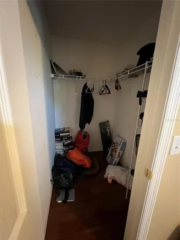 a bed room with a bed and a window