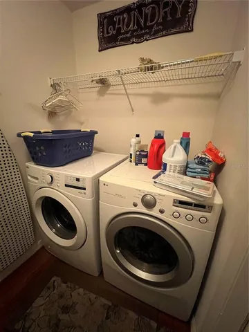 a utility room with dryer and washer