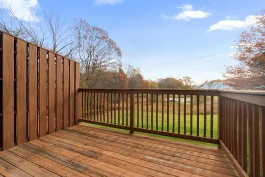 a view of a wooden fence