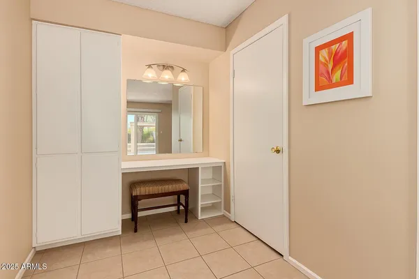 a view of an entryway with table and door