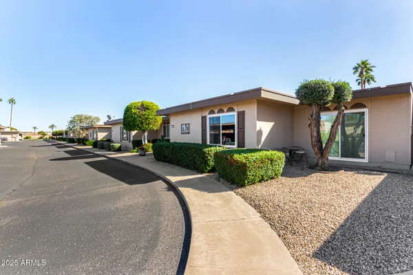 a view of a house with a patio