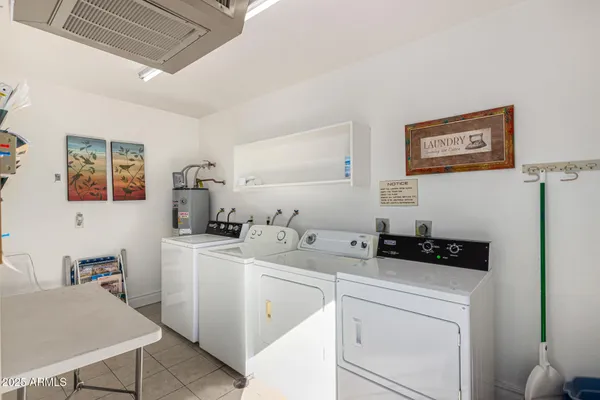 a view of a workspace with furniture