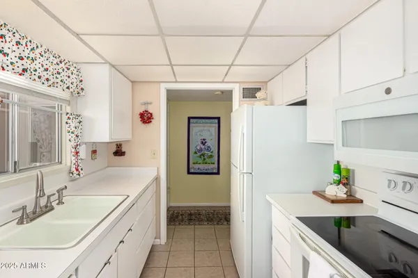 a spacious bathroom with a sink double vanity and shower
