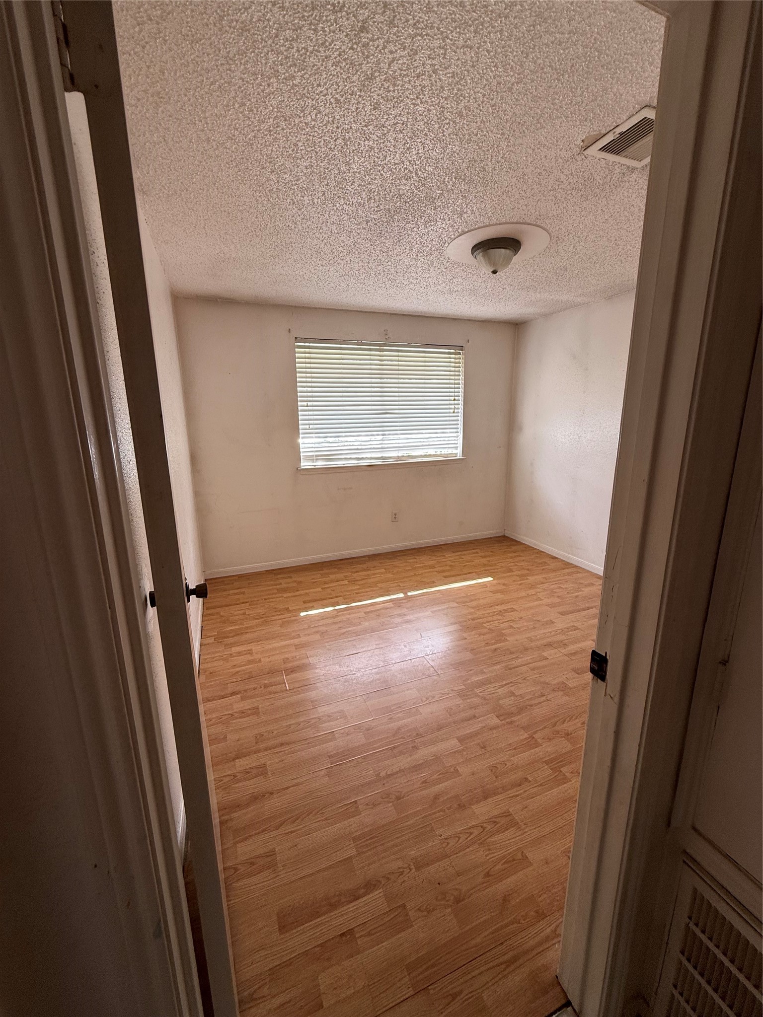 23914 Spring Briar Lane Spring, TX 77373 - Photo 4 of 21 a view of empty room with wooden floor