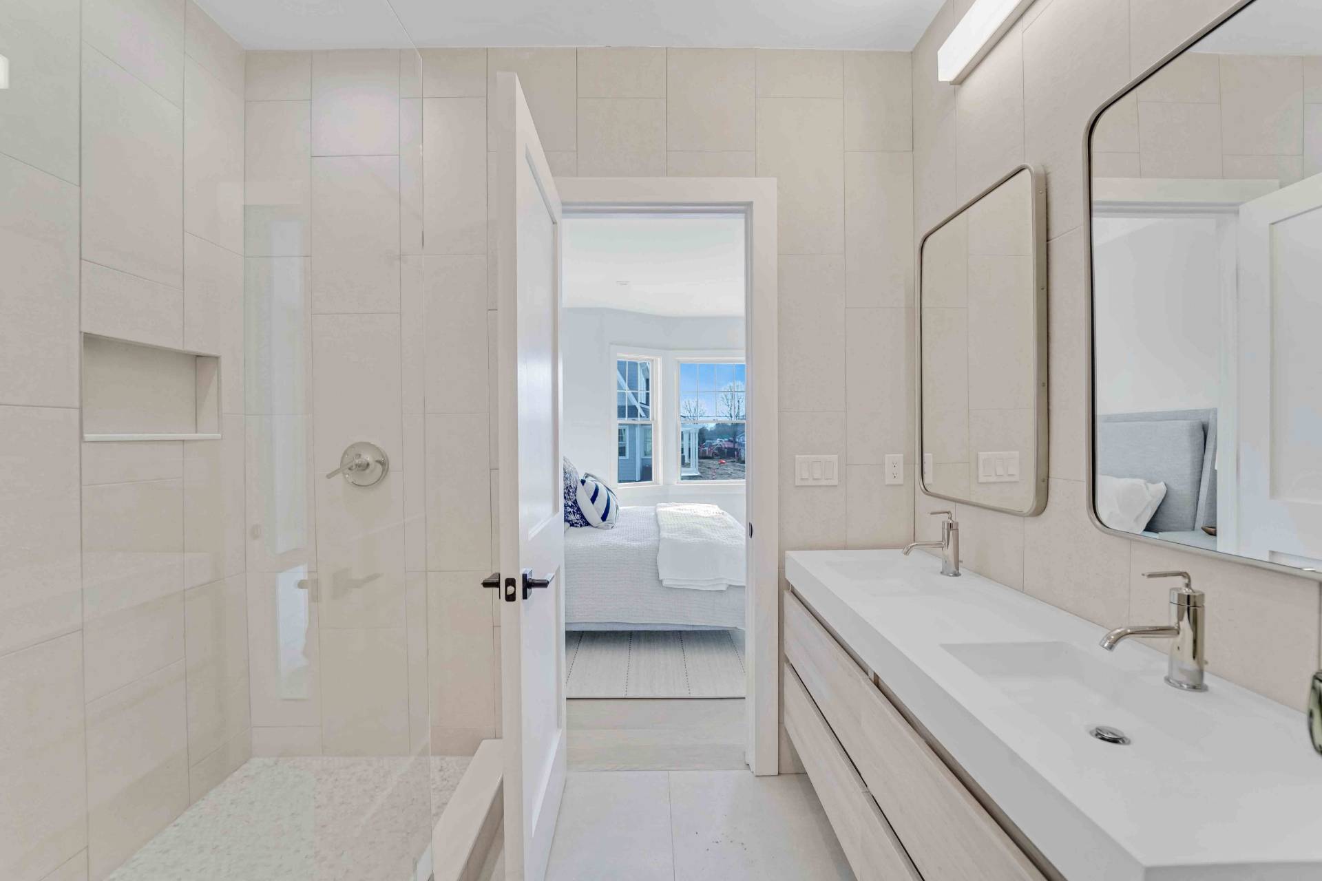 12 Depot Road, Unit 1502 Westhampton Beach, NY 11978 - Photo 13 of 26 a en suite bathroom with a sink a toilet and shower