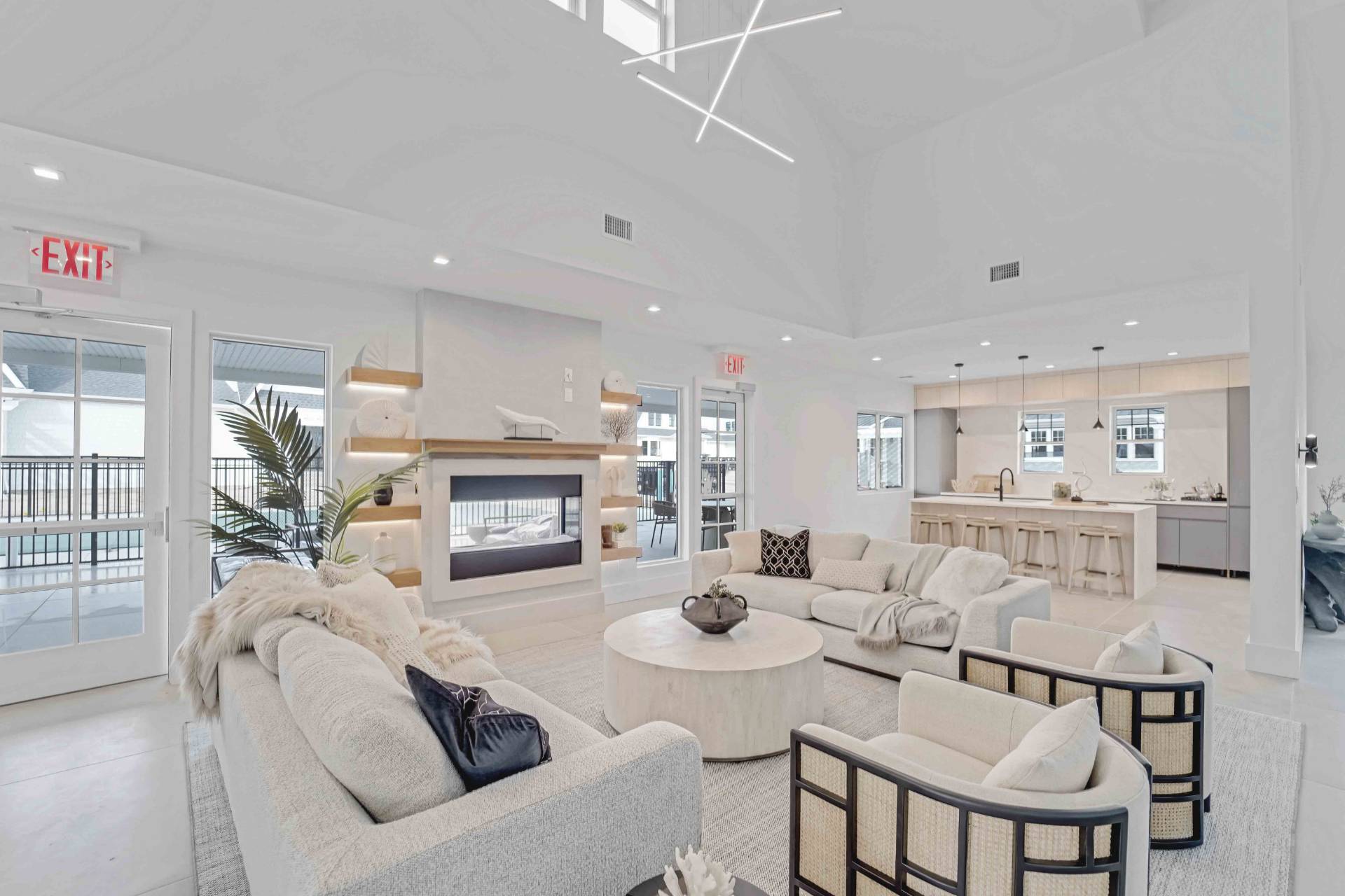 12 Depot Road, Unit 1502 Westhampton Beach, NY 11978 - Photo 7 of 26 a living room with furniture and a fireplace