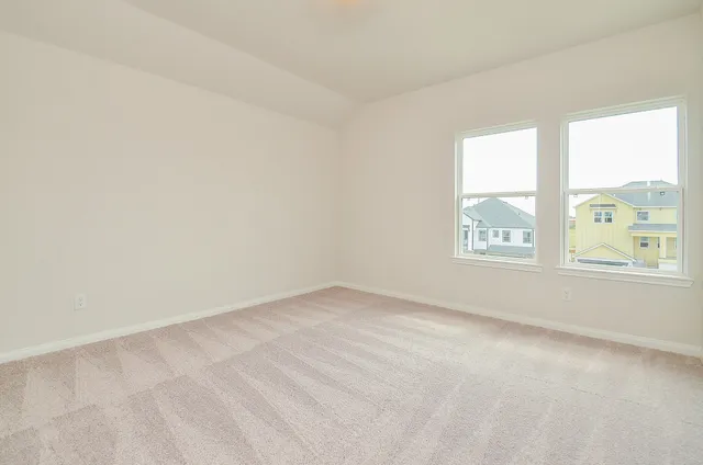 a bathroom with a bathtub and toilet