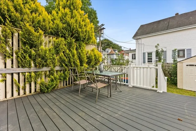 a view of a chairs on the roof deck
