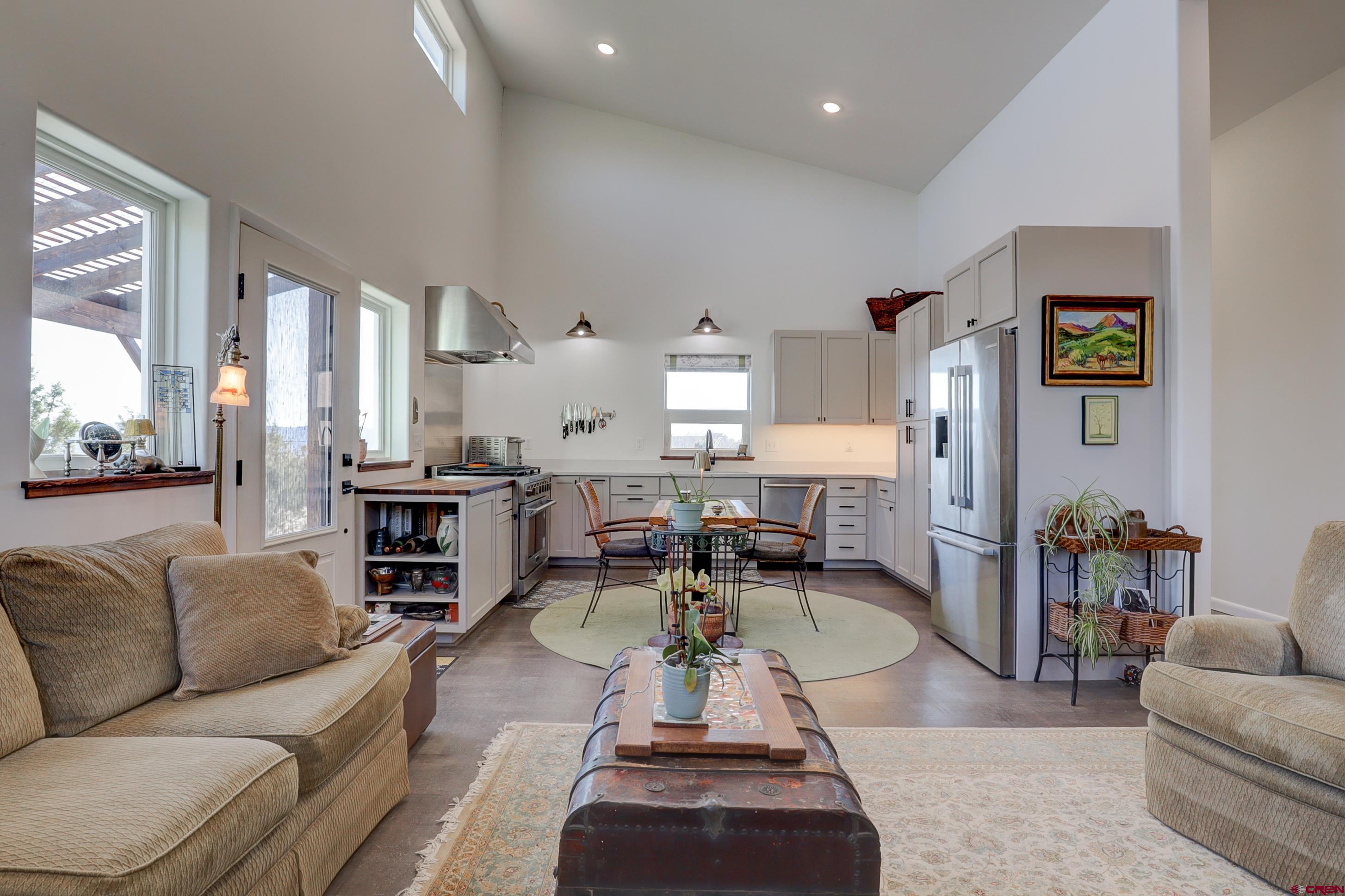 41839 Rd J.75 Mancos, CO 81328 - Photo 12 of 31 a living room with furniture or couch and a dining table
