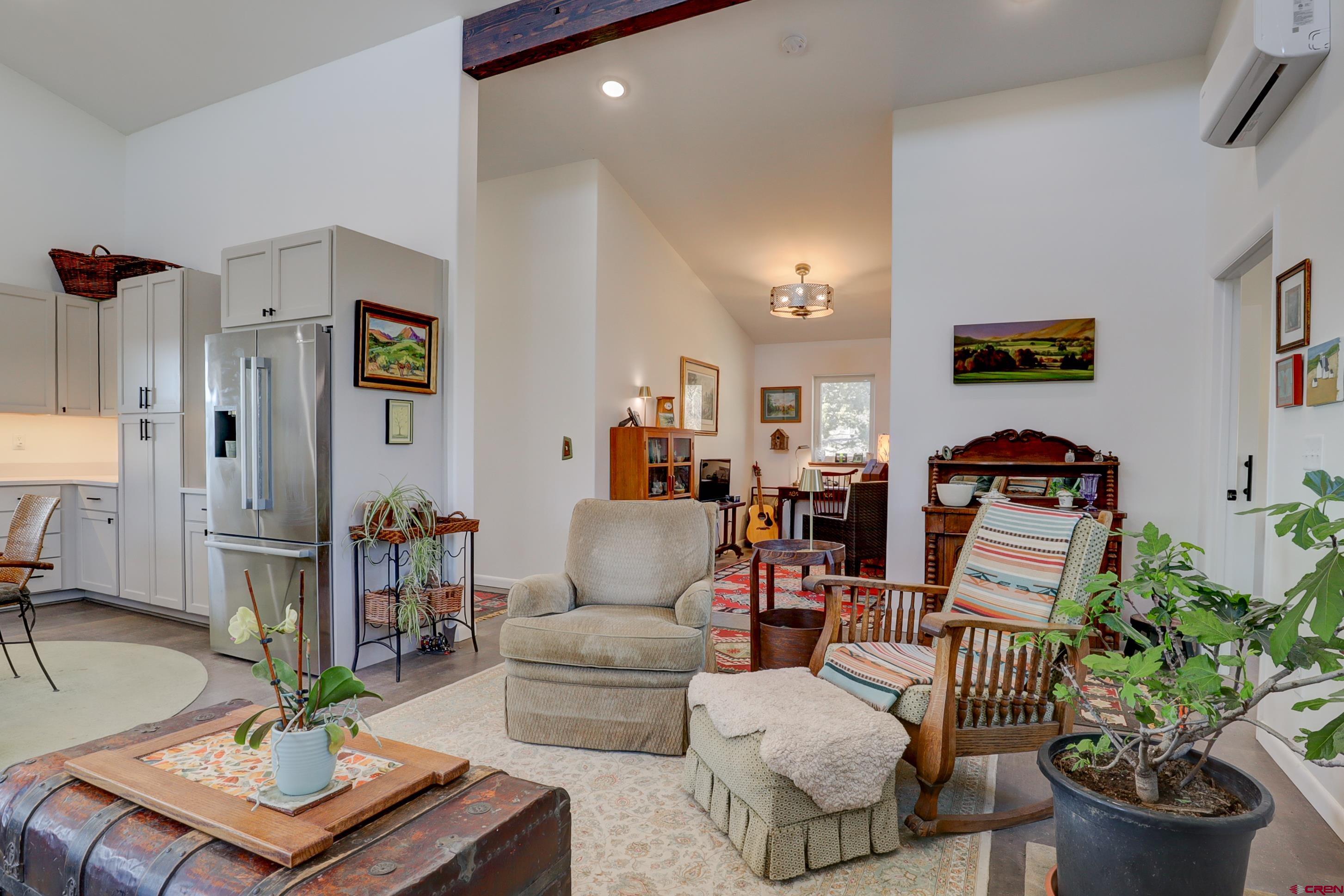 41839 Rd J.75 Mancos, CO 81328 - Photo 15 of 31 a living room with furniture and a potted plant